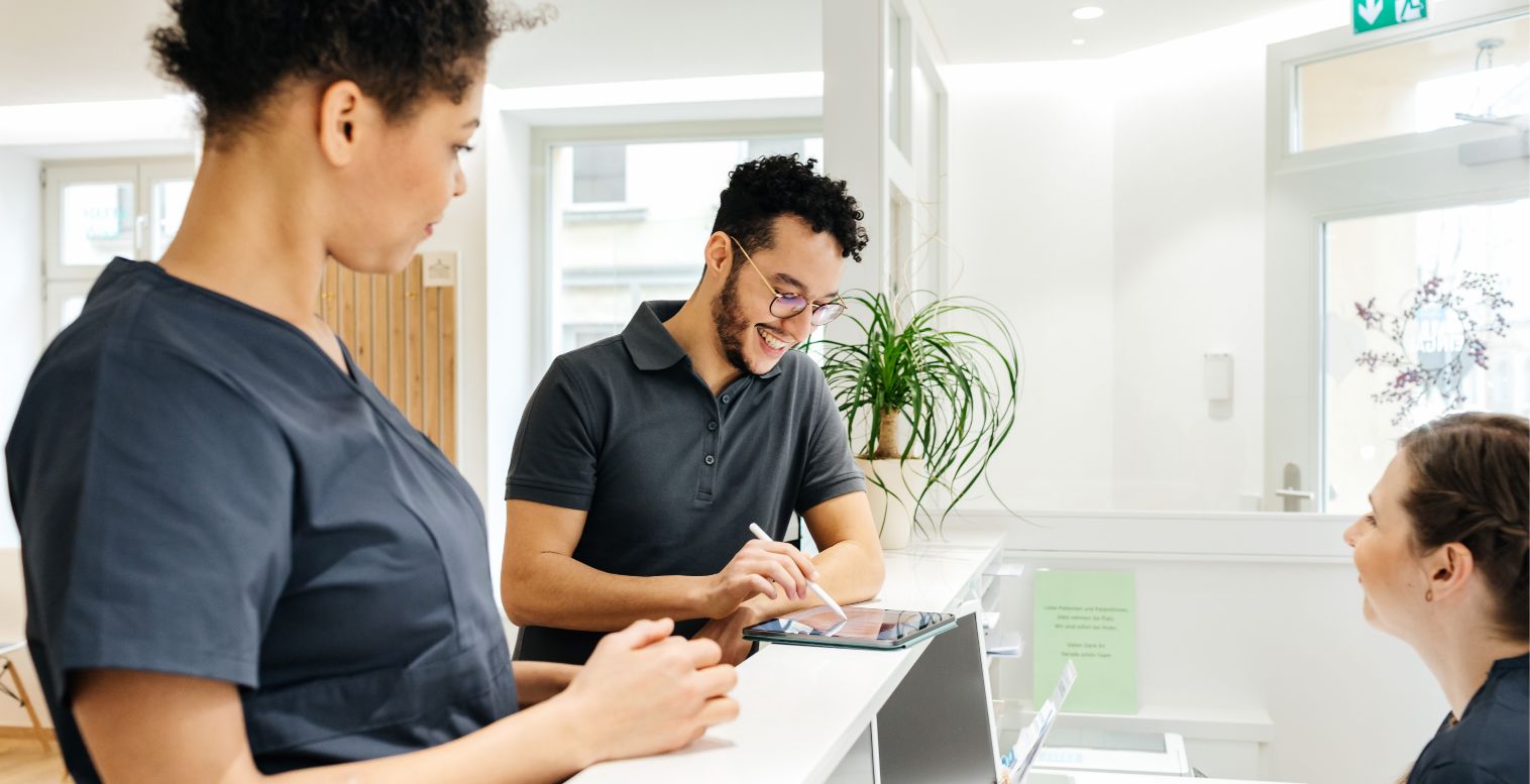 patient checking into a doctors office using a tablet