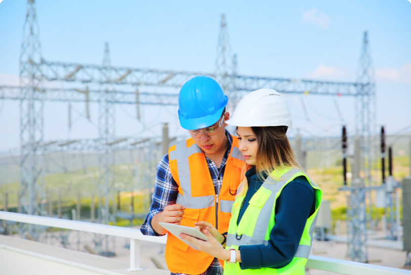 two field workers at construction site