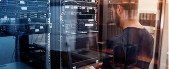 Environments Header man working on computer